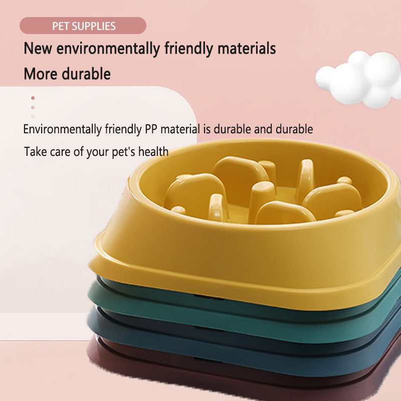 Dog slow-feeder bowls stack; five colorful bowls with a yellow top pillar design and internal pegs