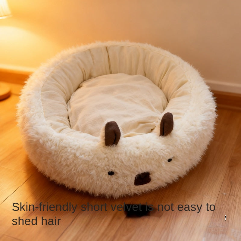 Round plush dog bed with cream faux fur, half-enclosed nest and soft inner cushion