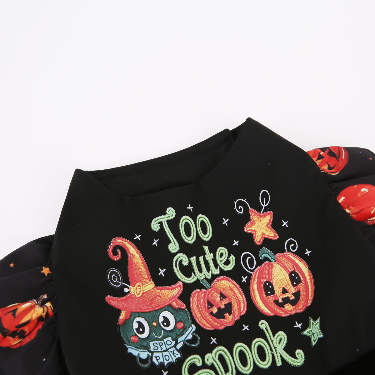 Dog Halloween costume for small dogs in black fabric with pumpkin witch print and green accents