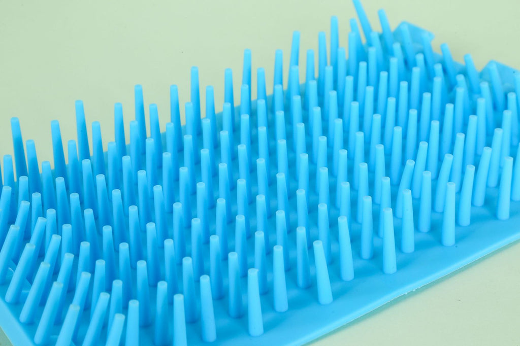 Paw Plunger Pet Paw Cleaner with soft blue silicone bristles, portable for home use