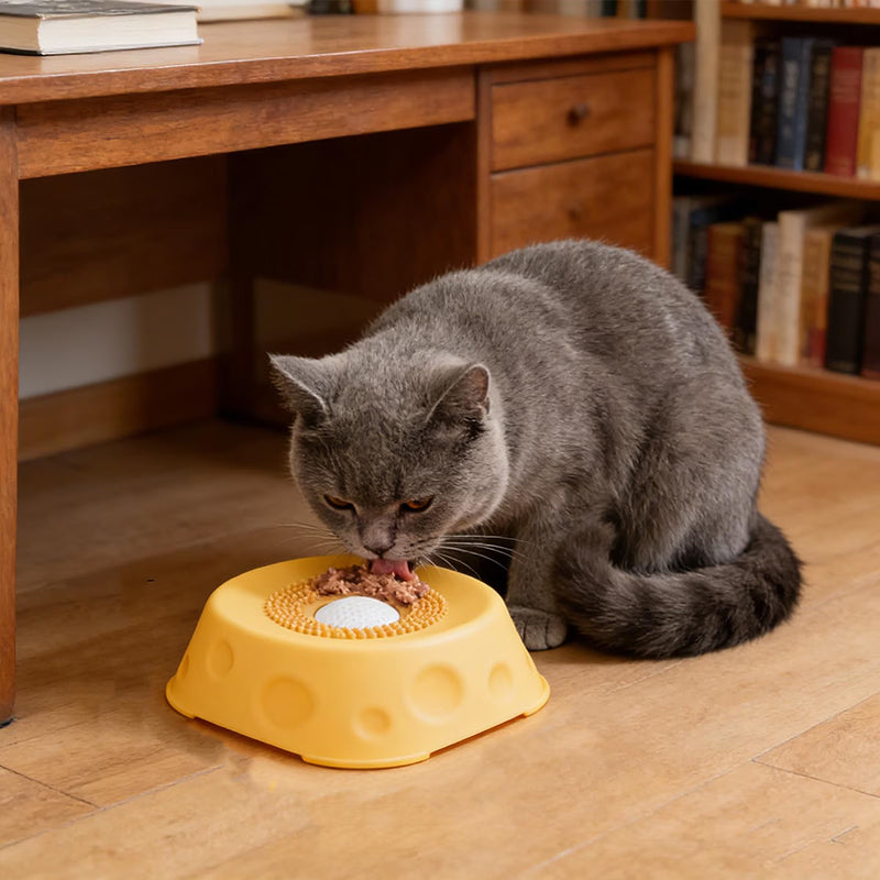 Silicone dog lick bowl slow feeder with rolling ball, yellow non-slip base