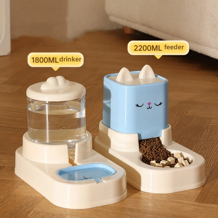 Automatic two-unit food and water feeder set with blue top; 2200ml dry food dispenser and 1800ml water drinker on white base.