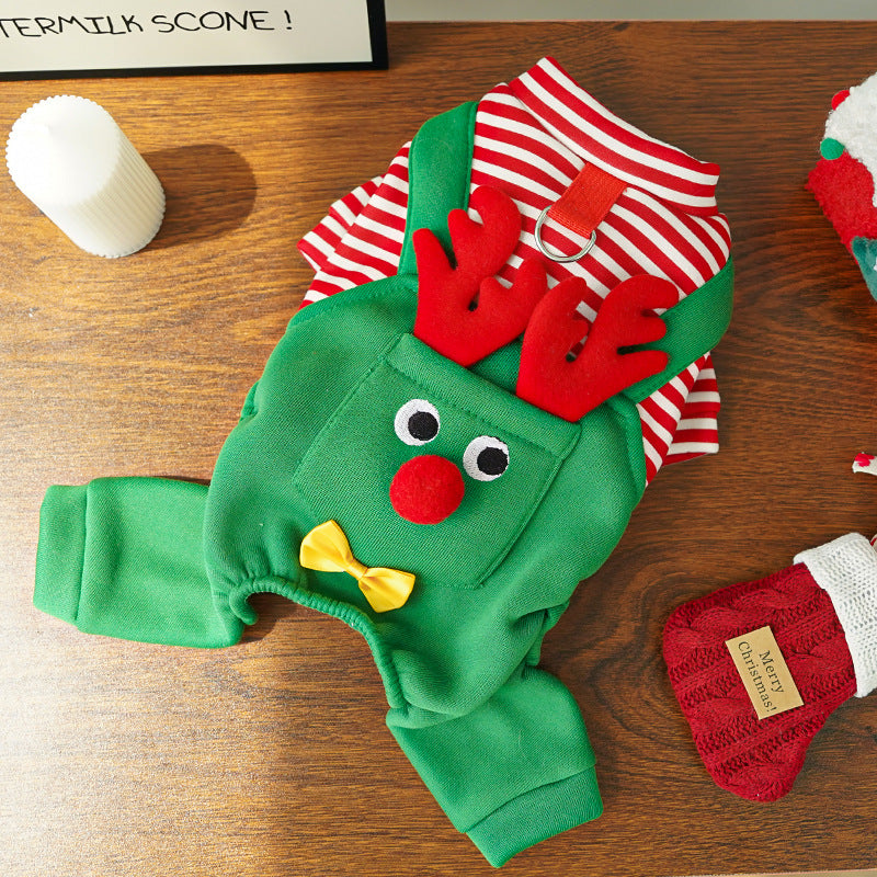 Reindeer pet costume: green Christmas jumpsuit with red nose, googly eyes, antlers and yellow bowtie.
