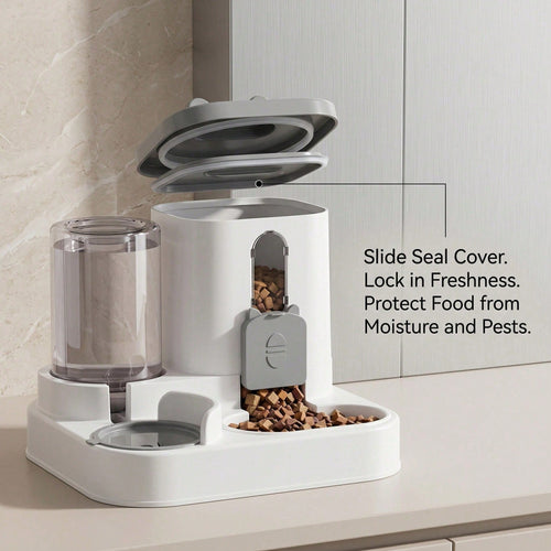 Feeder with slide seal cover open